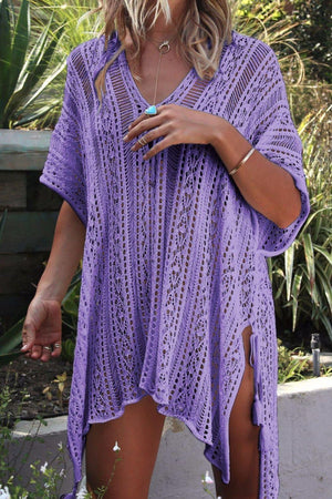 a woman wearing a purple crochet cover up