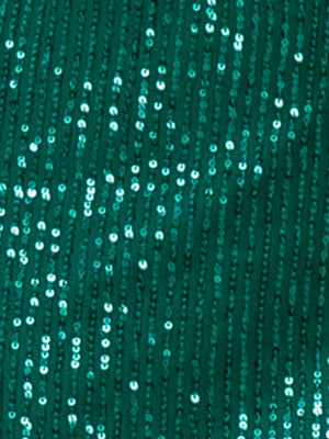 a close up of a green sequinized fabric