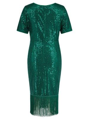 a green sequinned dress with fringes