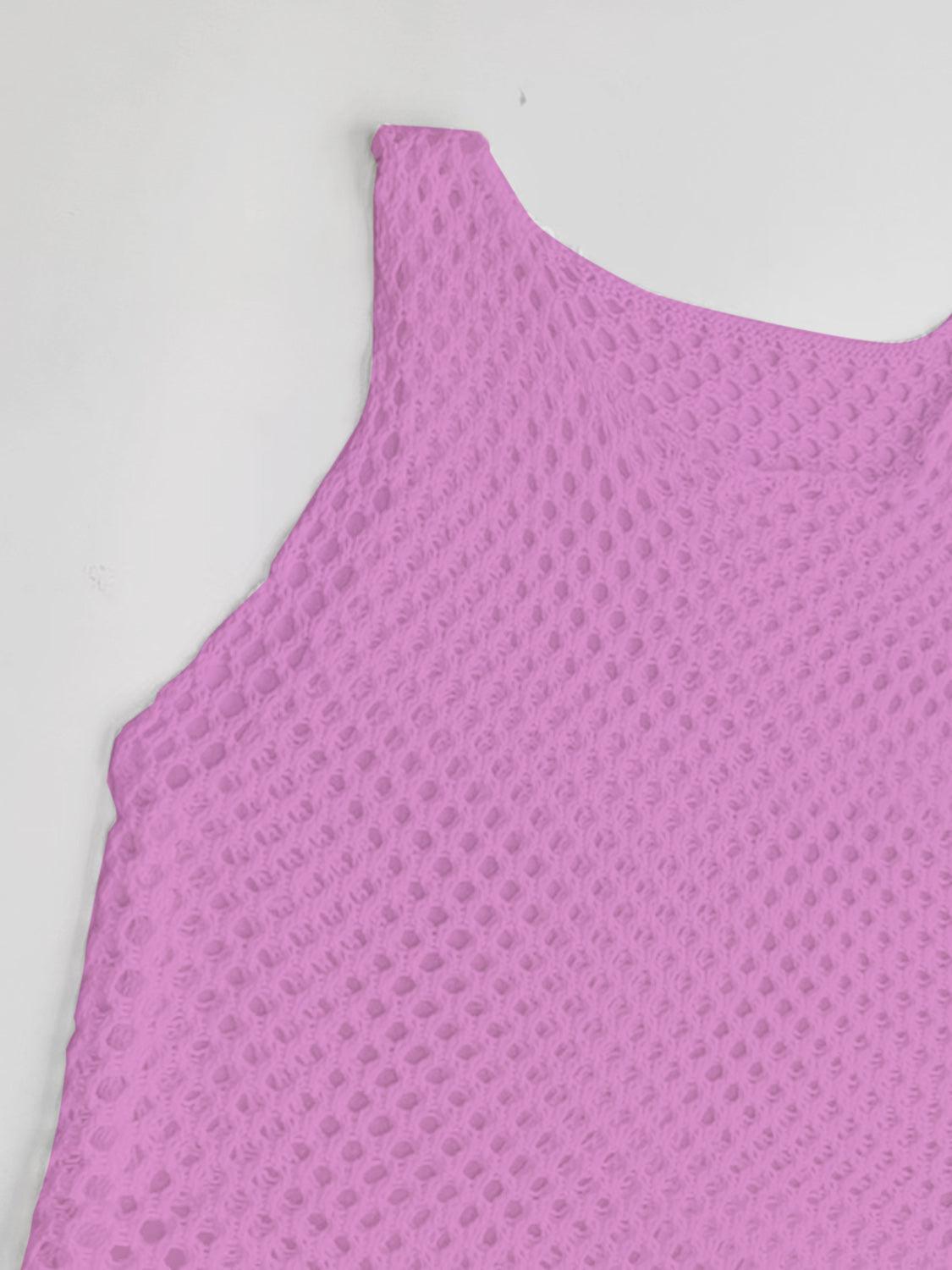 a close up of a pink top on a white surface