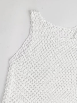 a close up of a white top on a white surface