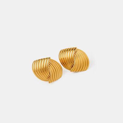 a pair of gold earrings on a white background