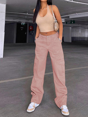 a woman is standing in a parking garage