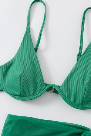 a green bikini top with a tie around it