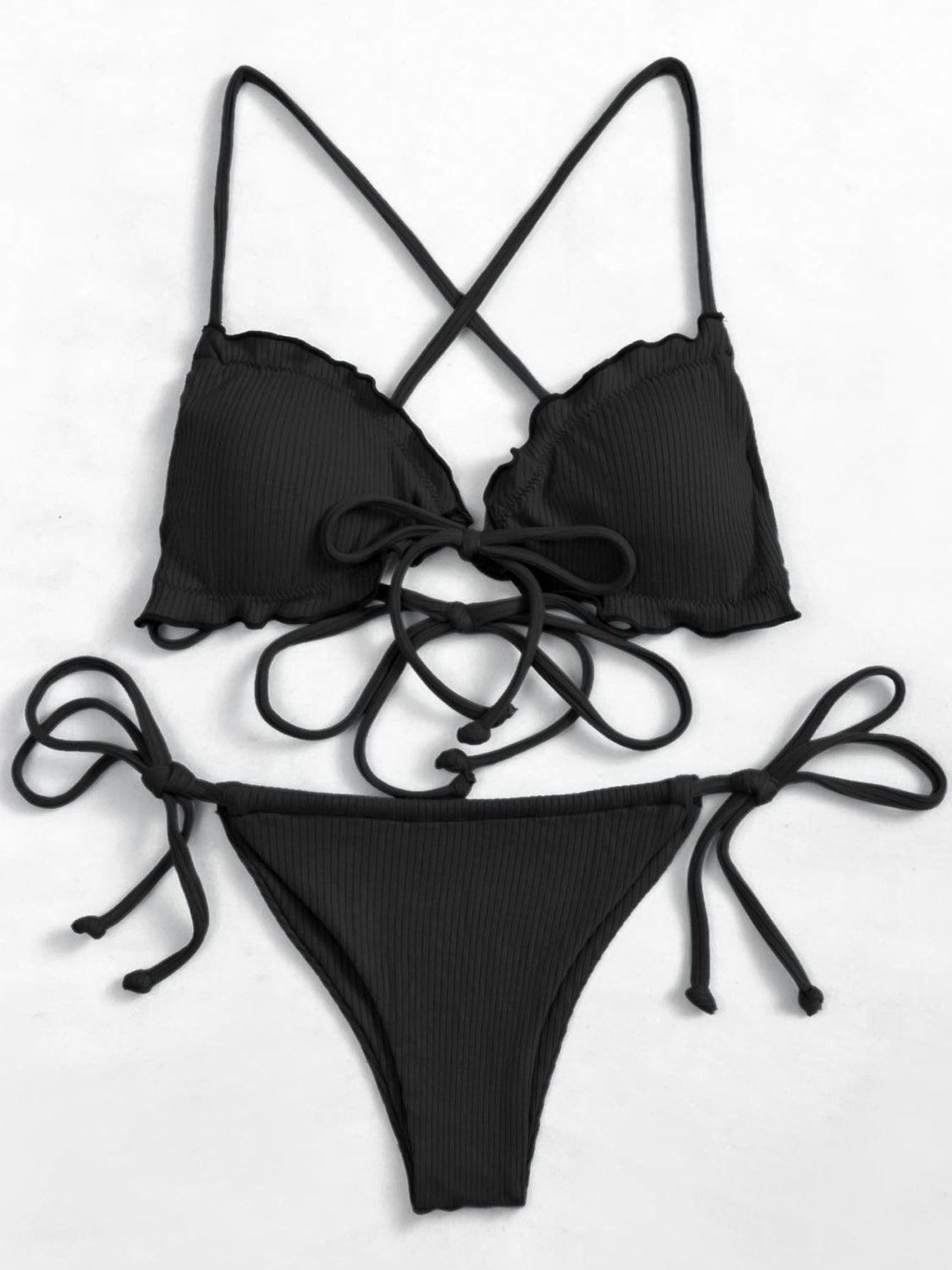 a black bikini top with a tie around the bottom