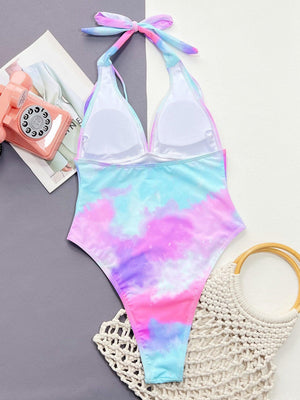 a bathing suit with a tie dye pattern