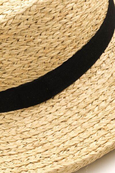 a close up of a straw hat on a white background