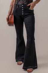 a woman in a black top and black jeans