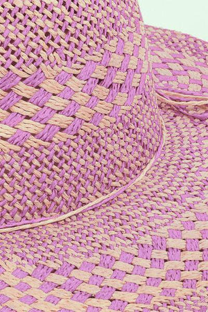 a close up of a straw hat on a white background