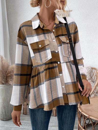 a woman wearing a plaid shirt and jeans