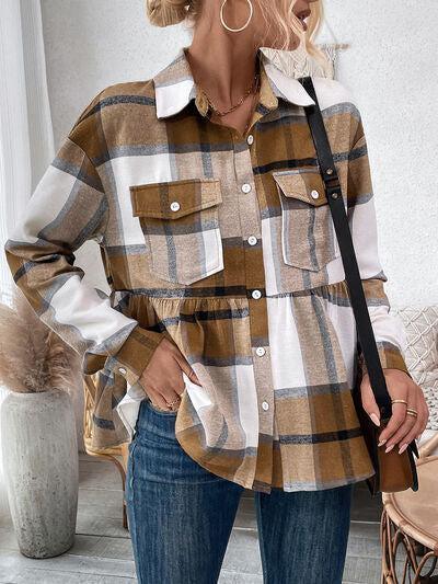a woman wearing a plaid shirt and jeans