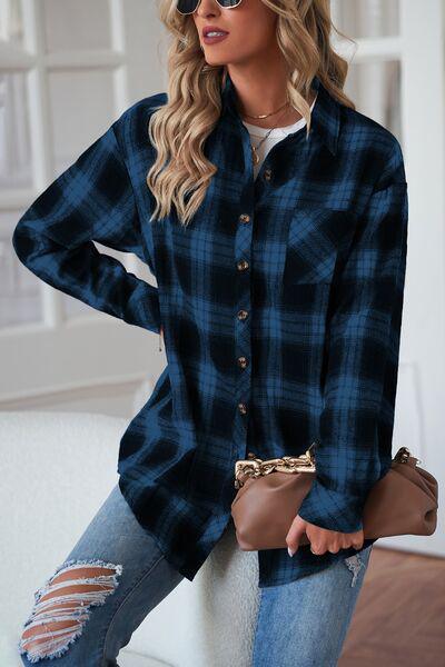 a woman wearing a black and blue plaid shirt