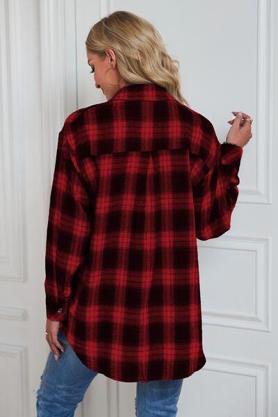a woman wearing a red and black plaid shirt