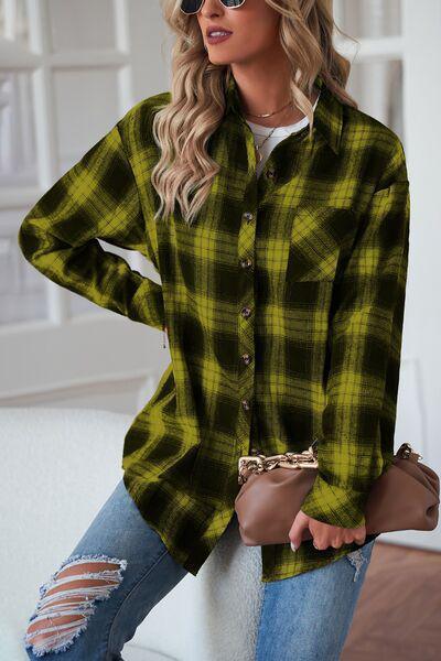 a woman wearing a green and black plaid shirt