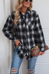 a woman wearing a black and white plaid shirt