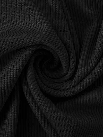 a black fabric textured with thin lines
