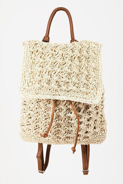 a crocheted bag hanging from a hook