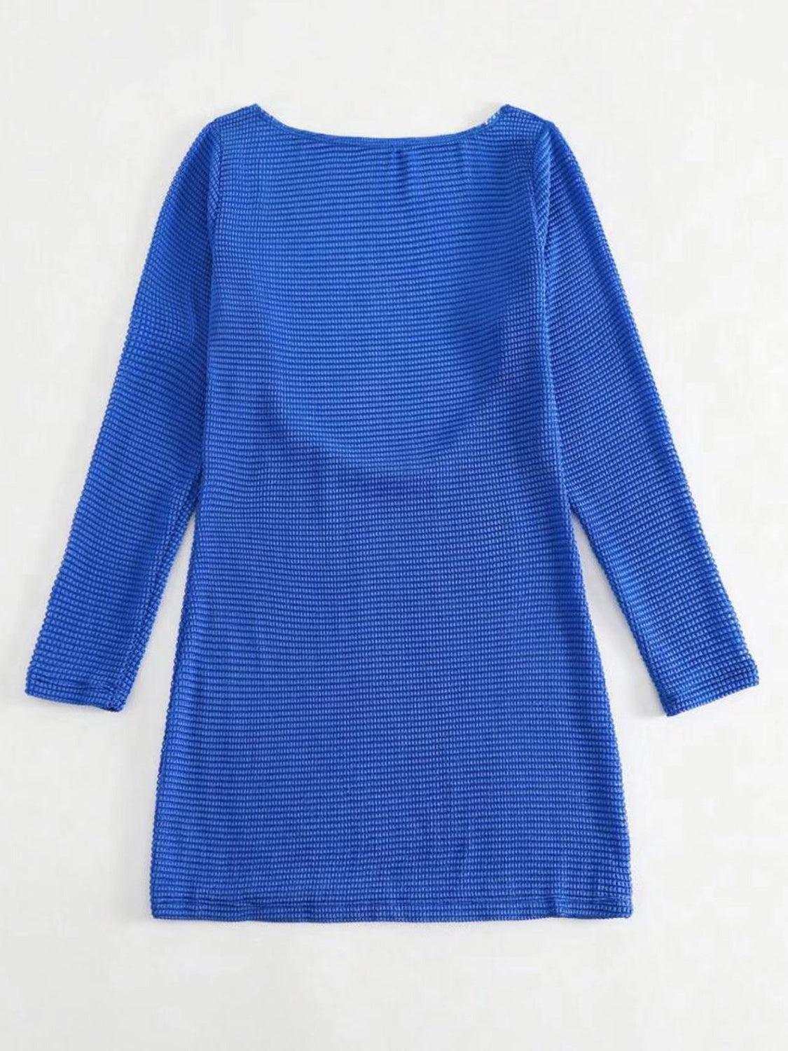 a women's blue sweater dress on a white background