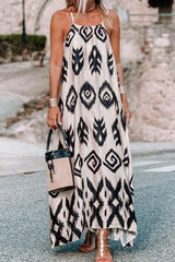 a woman in a black and white dress holding a handbag