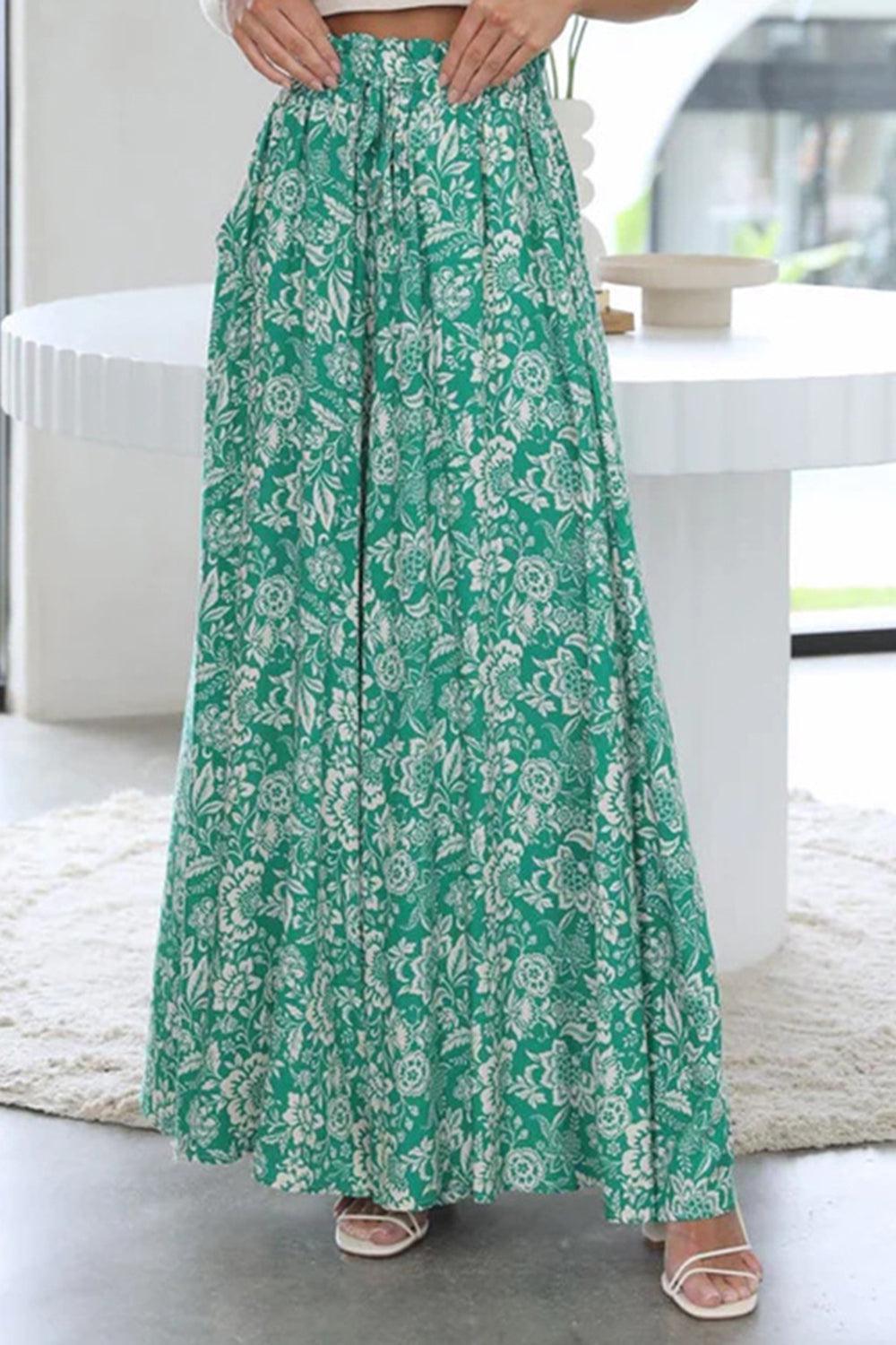 a woman standing in front of a white table