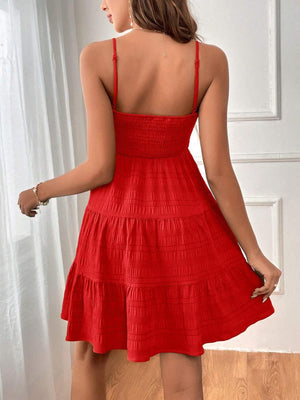 a woman in a red dress looking back