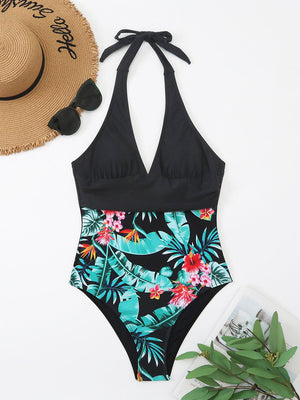 a bathing suit with a hat and sunglasses