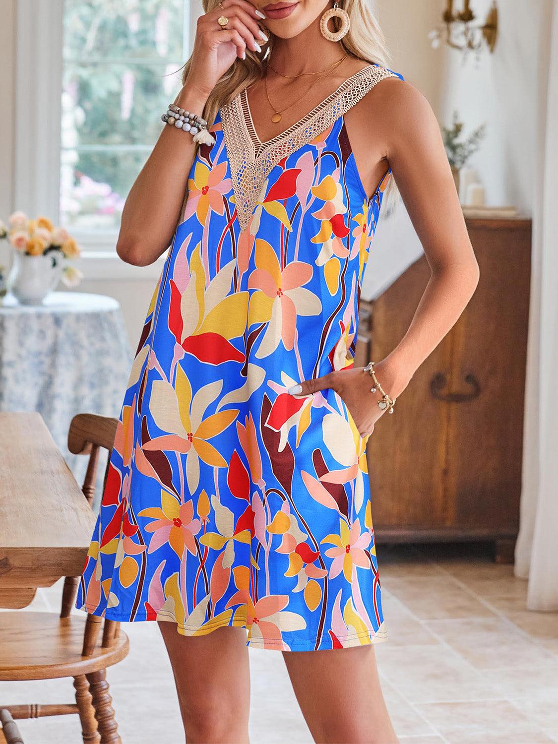 a woman in a colorful dress posing for a picture