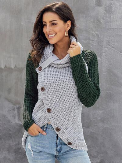 a woman wearing a green and white sweater