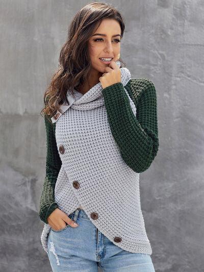 a woman wearing a green and white sweater