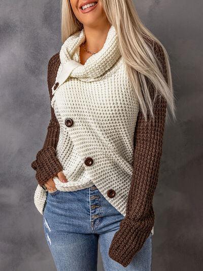 a woman with blonde hair wearing a sweater and jeans