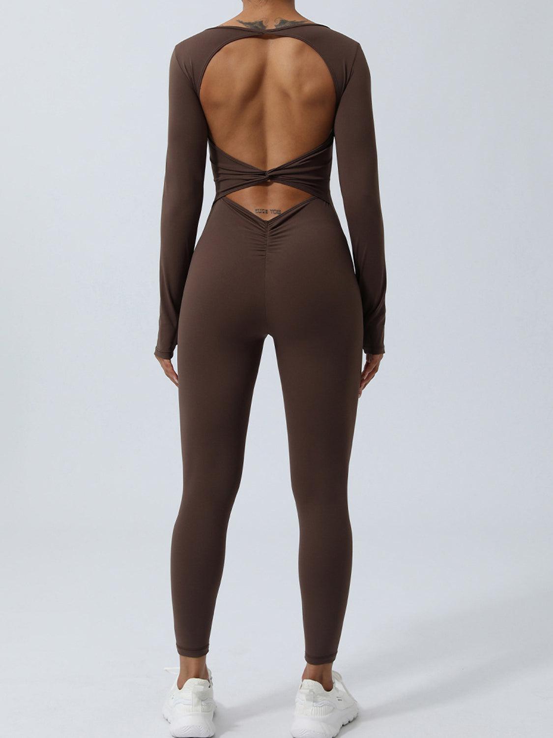 a woman in a brown bodysuit with a back cut out