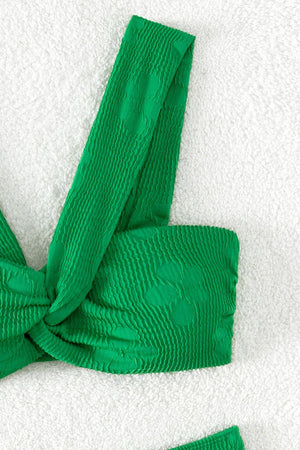 a close up of a tie on a towel