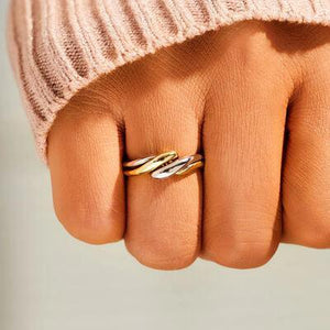 a woman's hand with a ring on it