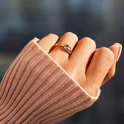 a woman's hand with a ring on it