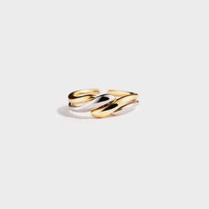 a pair of gold rings on a white background