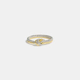 a white and yellow gold ring with a knot