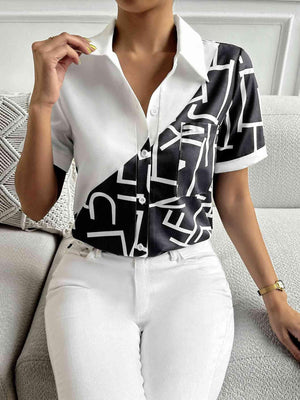 a woman in white pants and a black and white shirt