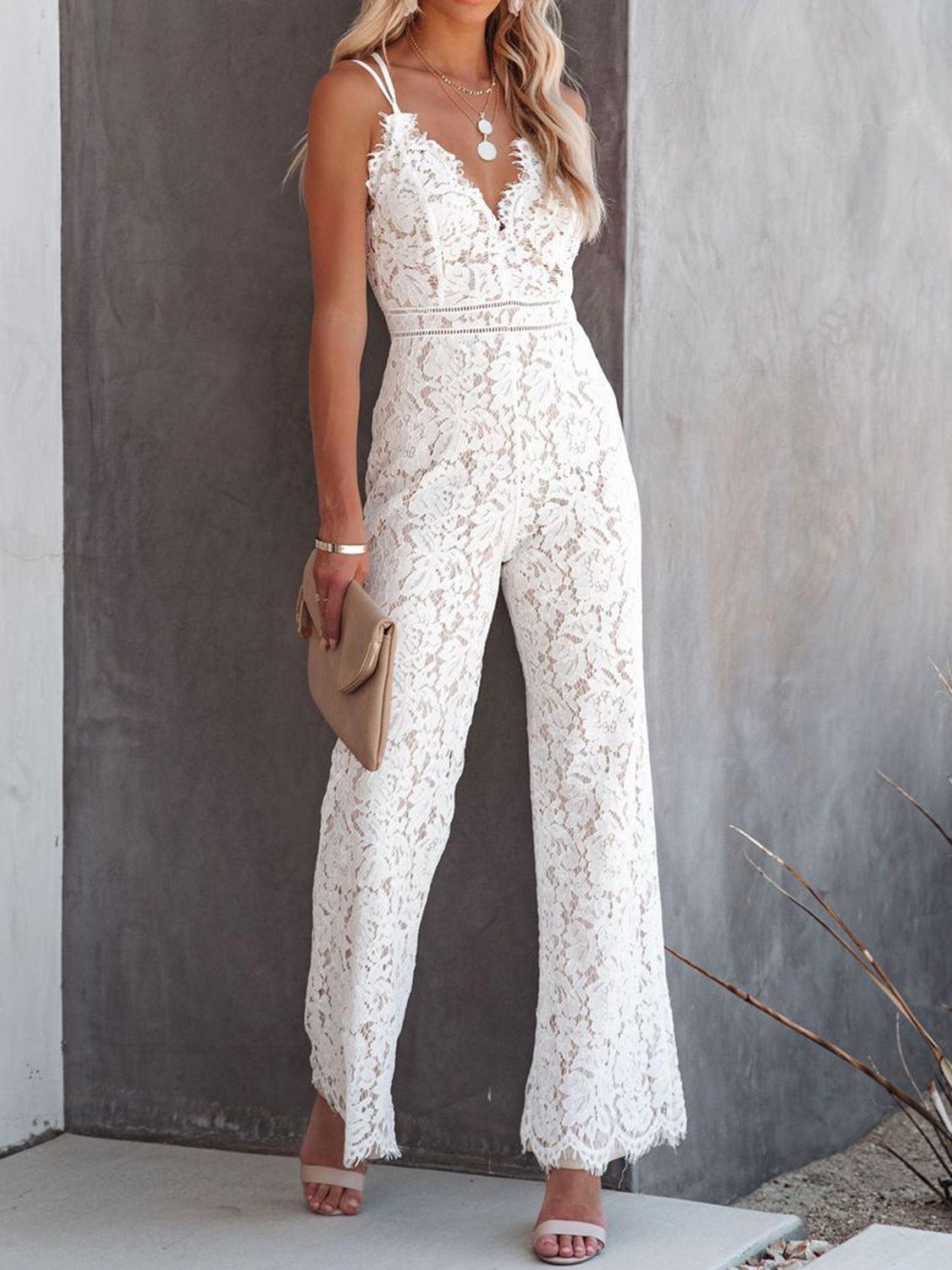 a woman wearing a white lace jumpsuit
