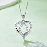 a diamond heart pendant on a chain