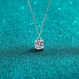 a diamond necklace on a blue background