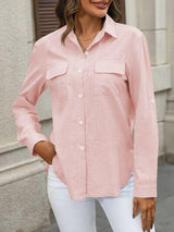 a woman wearing a pink shirt and white pants