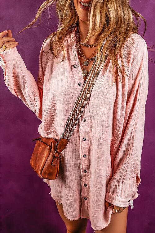 a woman in a pink shirt holding a brown purse