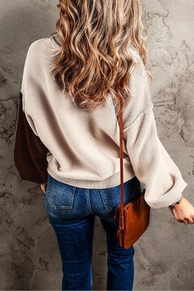 a woman with long hair is holding a purse