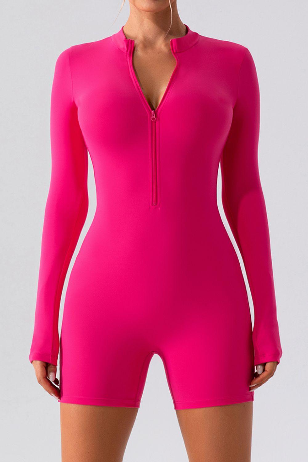 a woman in a bright pink bodysuit