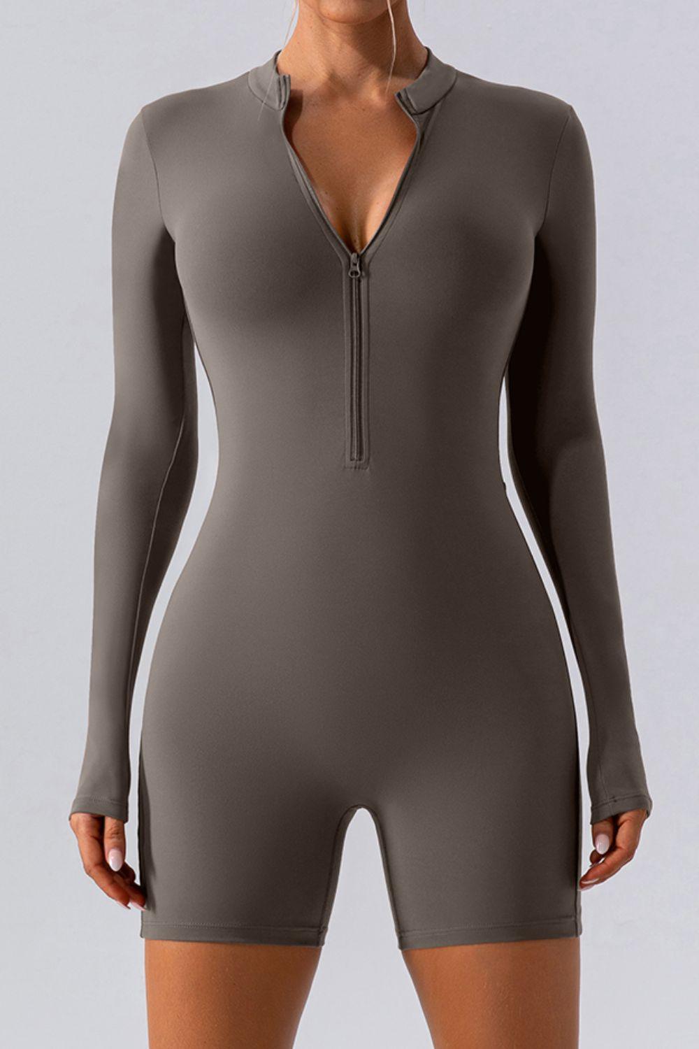a woman in a bodysuit with a zipper