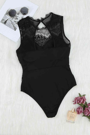 a black bodysuit with a skull on it