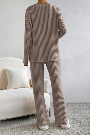 a woman standing in front of a white couch