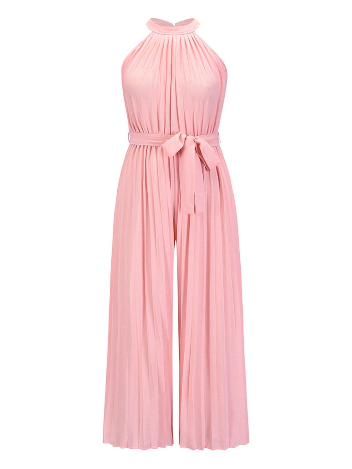 a pink jumpsuit with a bow at the waist