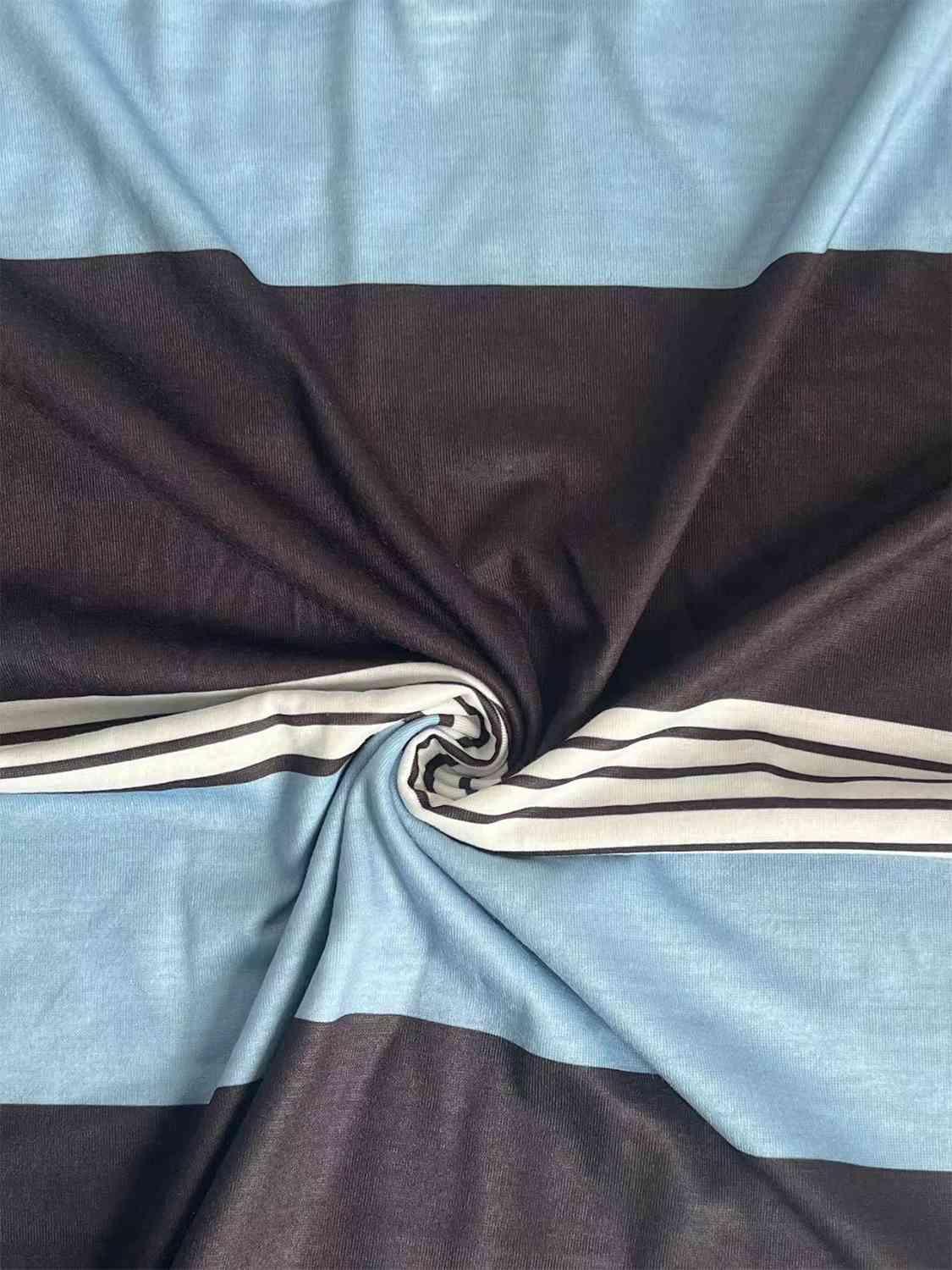 a close up of a blue and black striped fabric