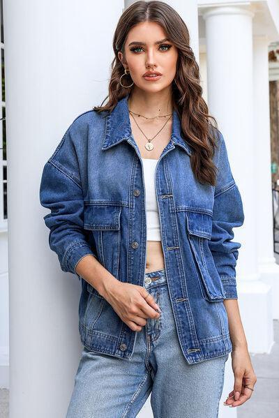 a woman wearing a denim jacket and jeans